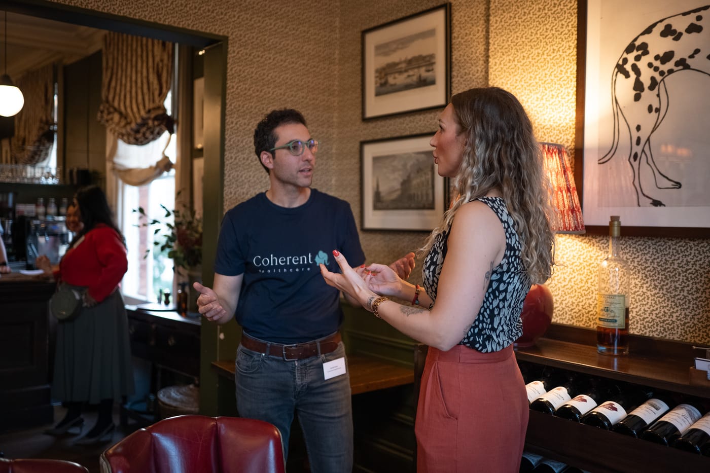 Two Clinic Circle members deep in conversation