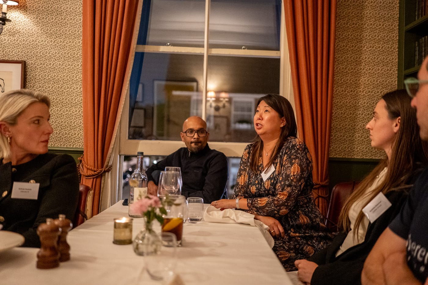 Clinic Circle members in conversation around the table
