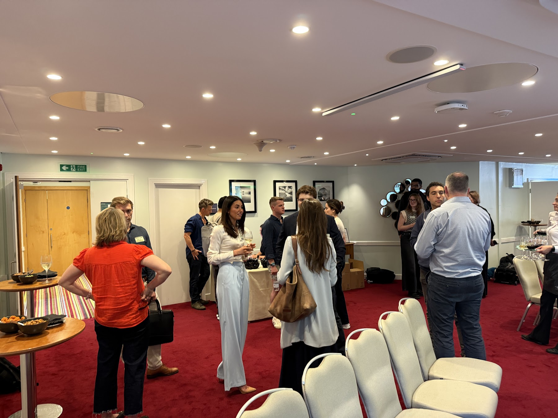 Clinic owners networking during the drinks reception